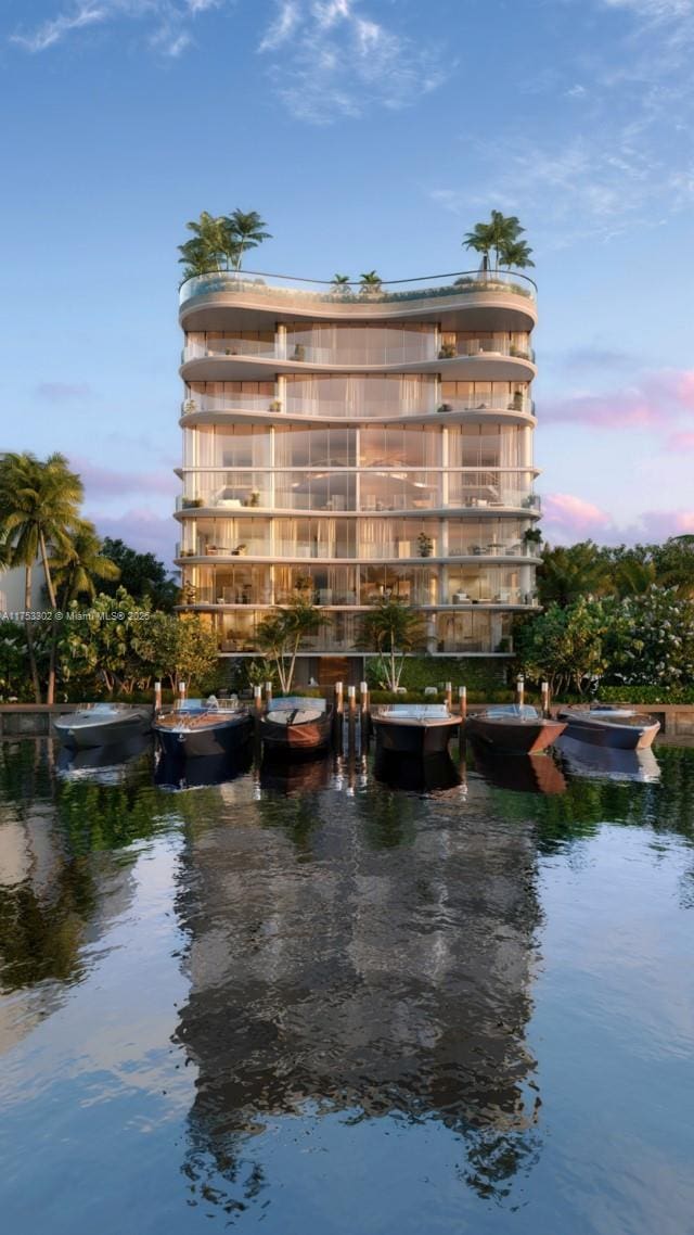 9110 W Bay Harbor Dr Unit 6, Bay Harbor Islands, FL 33154 - property at dusk with a water view