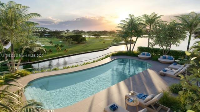 pool at dusk with an outdoor pool