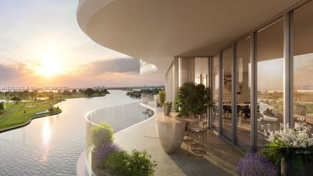 balcony featuring a water view