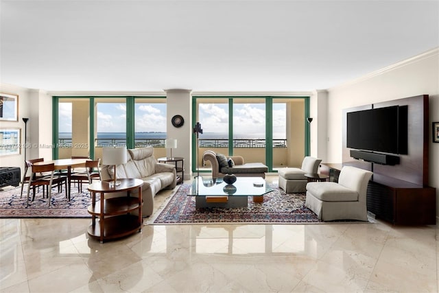 living room with marble finish floor, floor to ceiling windows, and crown molding