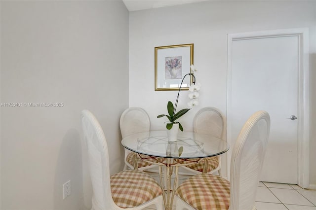 dining room featuring light tile patterned floors