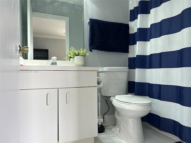 full bathroom with tile patterned flooring, curtained shower, vanity, and toilet