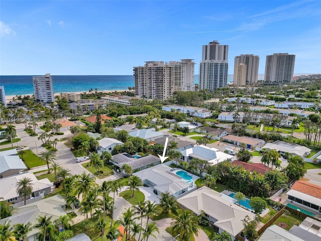 drone / aerial view with a water view and a view of city