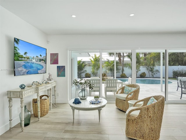 interior space featuring a wealth of natural light, baseboards, and recessed lighting