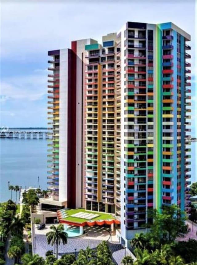 view of building exterior featuring a water view