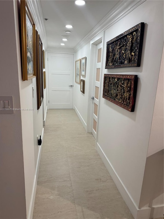 hallway featuring crown molding, recessed lighting, and baseboards