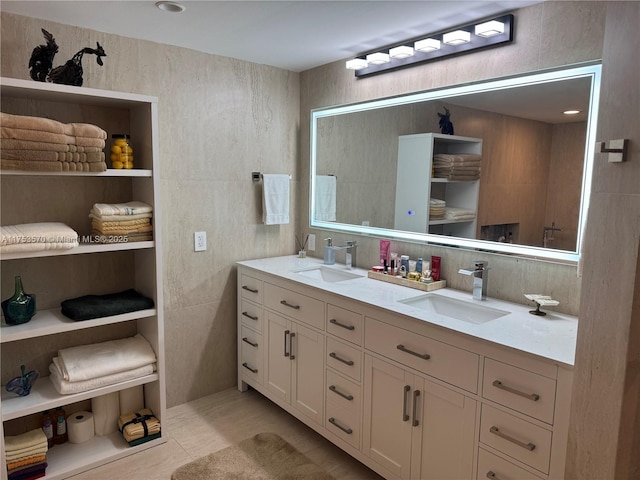 bathroom with double vanity and a sink