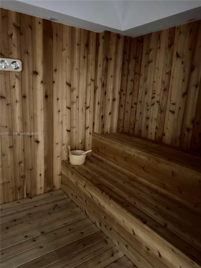 view of sauna with wood finished floors