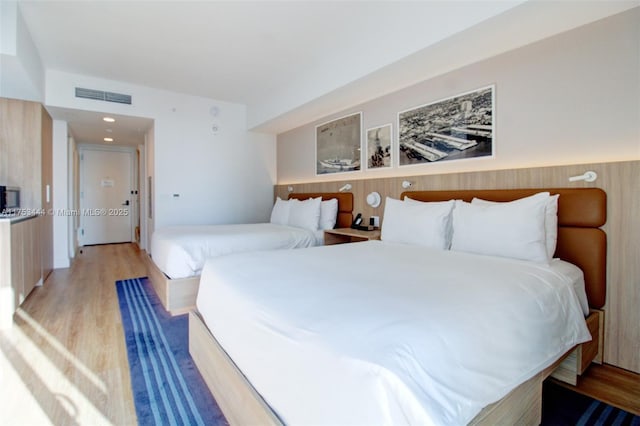 601 NE 1st Ave Unit 1706, Miami, FL 33132 - bedroom featuring light wood finished floors and visible vents