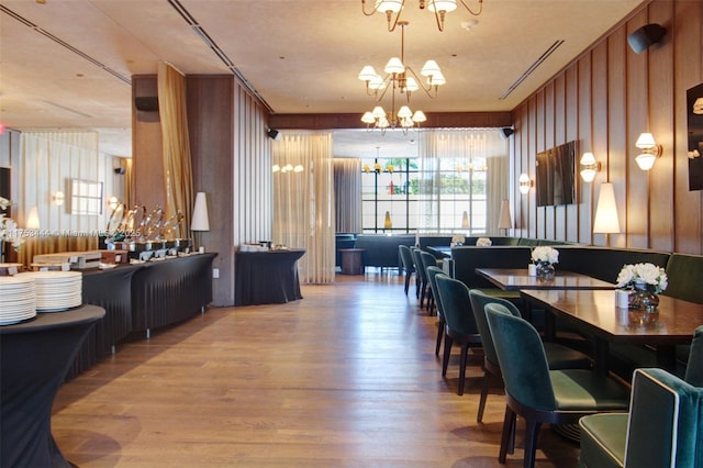 601 NE 1st Ave Unit 1706, Miami, FL 33132 - dining room with wood finished floors and a notable chandelier