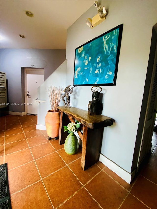200 Azure Way, Miami Springs, FL 33166 - hall featuring tile patterned flooring and baseboards