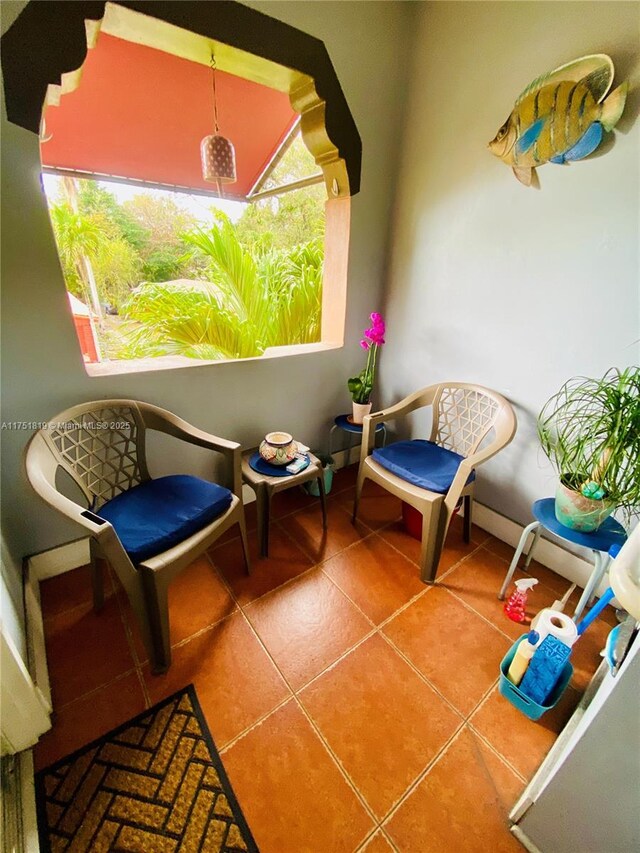 200 Azure Way, Miami Springs, FL 33166 - living area featuring tile patterned flooring and baseboards