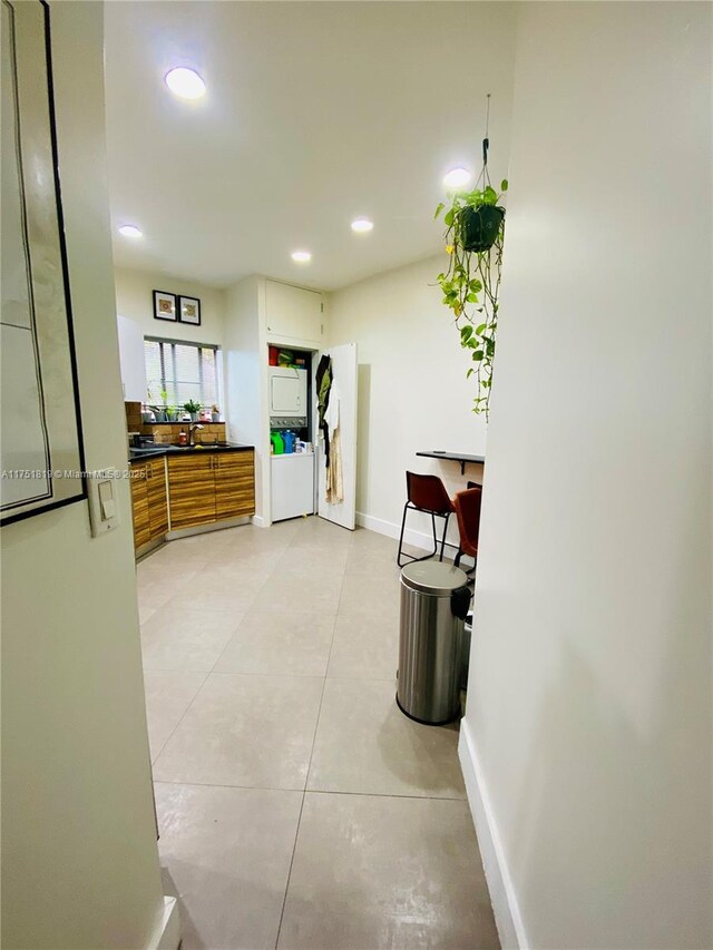 200 Azure Way, Miami Springs, FL 33166 - kitchen with dark countertops, brown cabinets, baseboards, and recessed lighting
