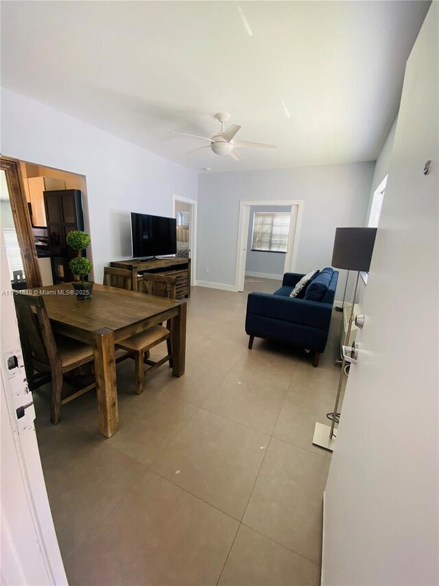 200 Azure Way, Miami Springs, FL 33166 - living area featuring ceiling fan, light tile patterned flooring, and baseboards