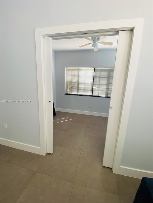 200 Azure Way, Miami Springs, FL 33166 - tiled spare room with ceiling fan and baseboards