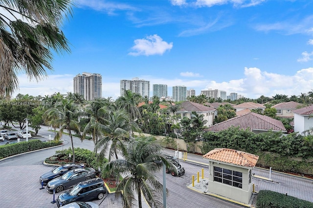 birds eye view of property featuring a city view