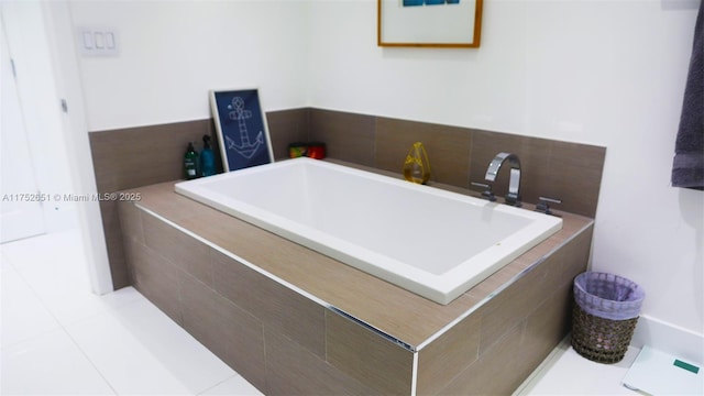 bathroom with a garden tub