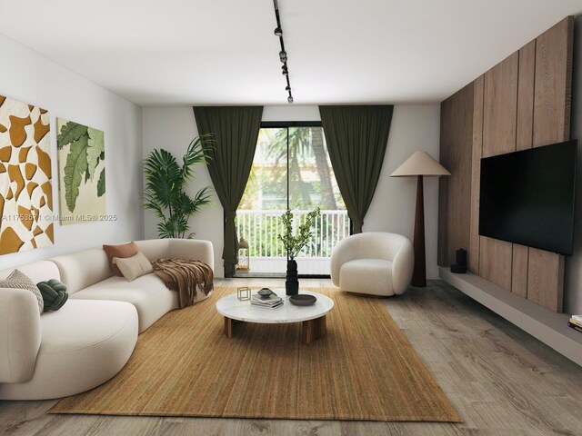 sitting room featuring wood finished floors