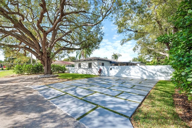 view of front of house with fence