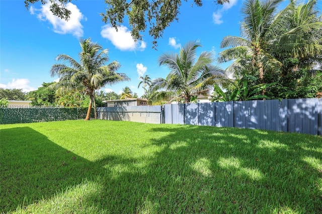 view of yard featuring fence