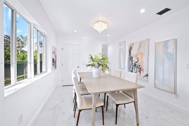 dining room with marble finish floor, a notable chandelier, recessed lighting, visible vents, and baseboards