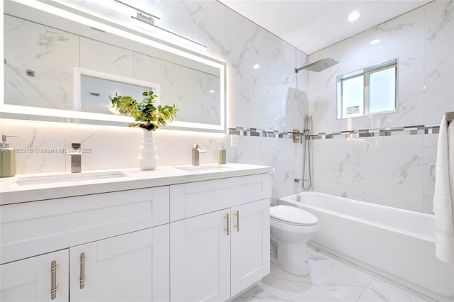 full bathroom featuring marble finish floor, a sink, toilet, and double vanity