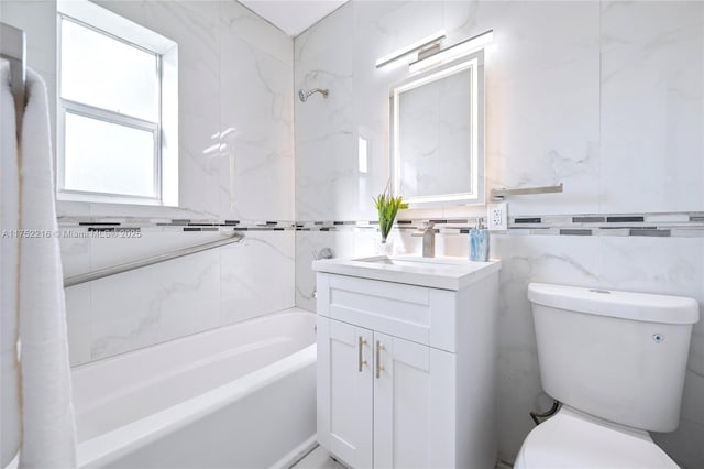 full bathroom featuring shower / bathtub combination, vanity, toilet, and tile walls