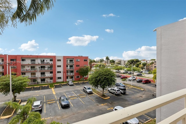 8425 NW 8th St Unit 404, Miami, FL 33126 - full bathroom with a shower with shower curtain, a textured ceiling, toilet, and tile walls