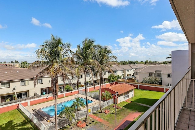 8425 NW 8th St Unit 404, Miami, FL 33126 - view of swimming pool featuring a residential view and a fenced backyard