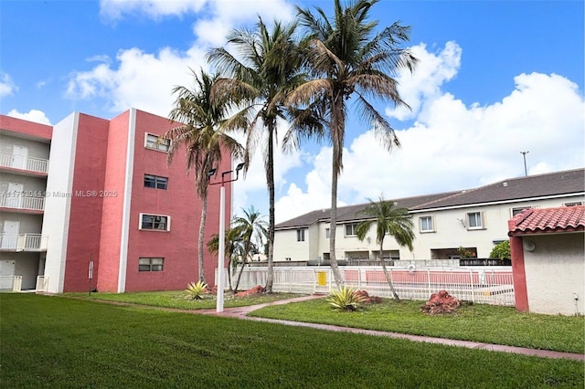 view of property featuring fence