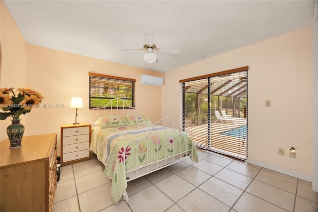 bedroom with a wall unit AC, access to outside, multiple windows, and ceiling fan