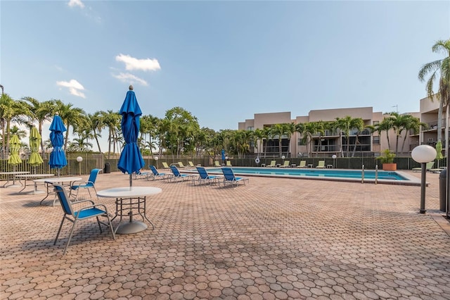 exterior space with a patio area and fence