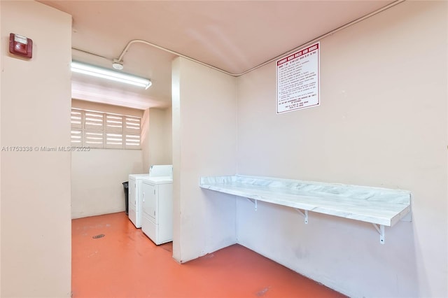 laundry room with separate washer and dryer