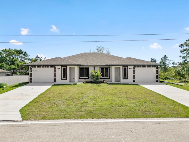 ranch-style home featuring stucco siding, concrete driveway, an attached garage, a front yard, and fence