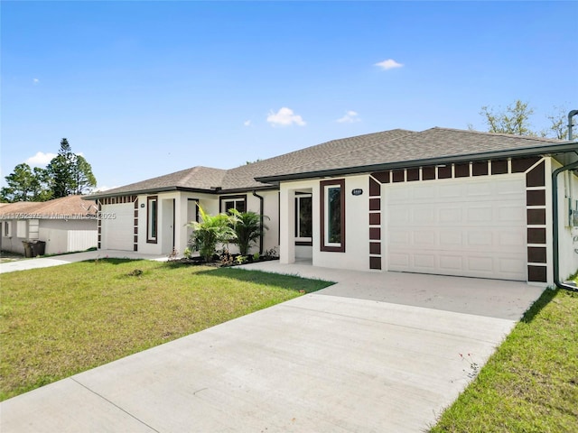 view of front of property featuring concrete driveway, a front lawn, an attached garage, and stucco siding