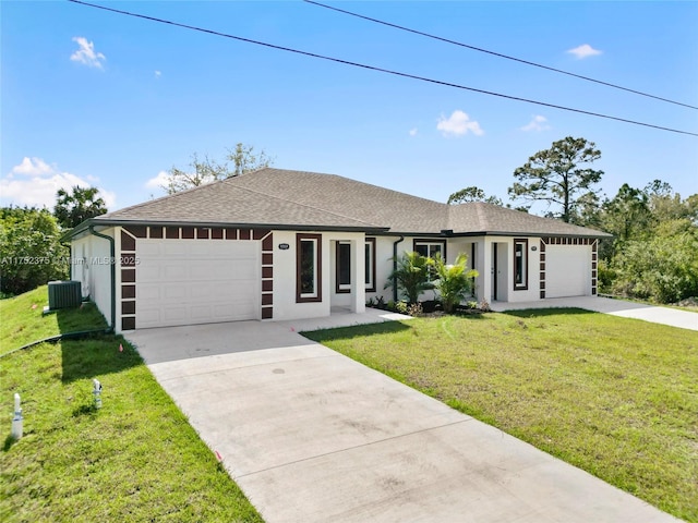 ranch-style house with a garage, concrete driveway, and central air condition unit