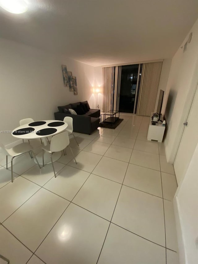 living room featuring light tile patterned flooring