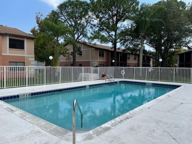 community pool with fence