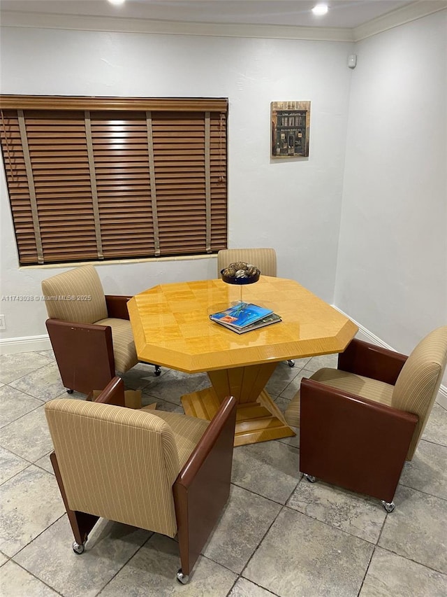 dining room with ornamental molding, recessed lighting, and baseboards