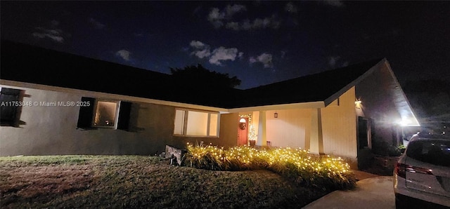 view of front of home featuring stucco siding