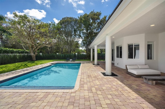 view of swimming pool with a fenced in pool, a patio area, and a fenced backyard