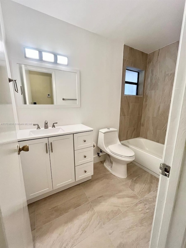 bathroom featuring shower / bath combination, vanity, and toilet