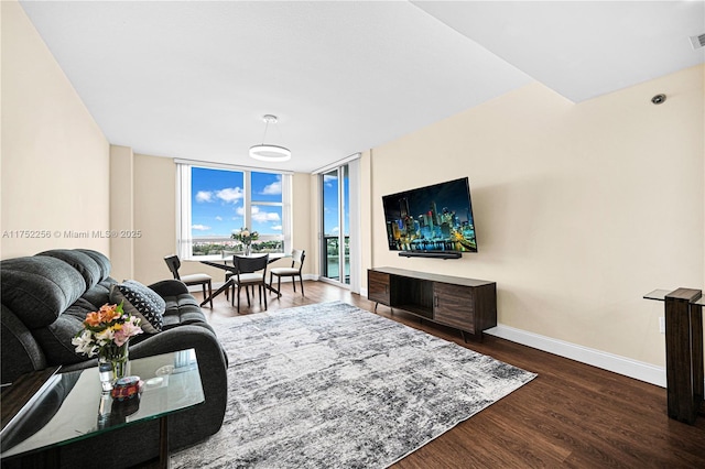 2681 N Flamingo Rd Unit 1103S, Sunrise, FL 33323 - living area featuring wood finished floors and baseboards