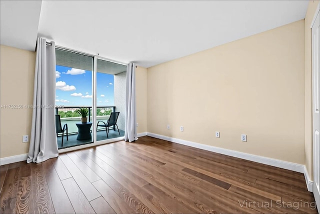 2681 N Flamingo Rd Unit 1103S, Sunrise, FL 33323 - spare room featuring wood finished floors and expansive windows