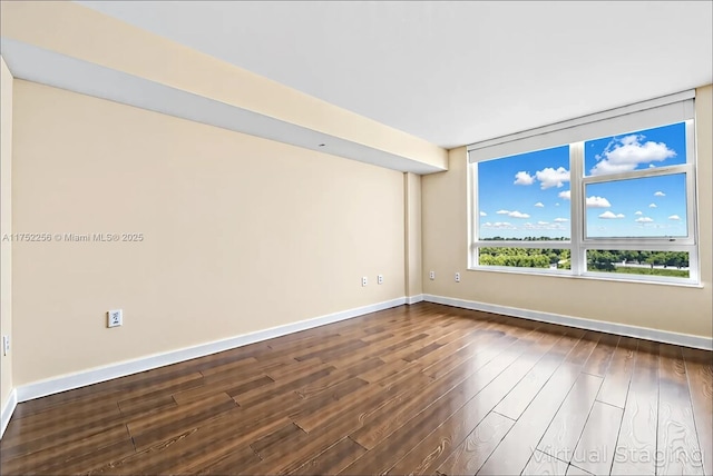 2681 N Flamingo Rd Unit 1103S, Sunrise, FL 33323 - empty room featuring dark wood-type flooring and baseboards