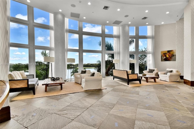 2681 N Flamingo Rd Unit 1103S, Sunrise, FL 33323 - community lobby with a high ceiling, recessed lighting, and a water view