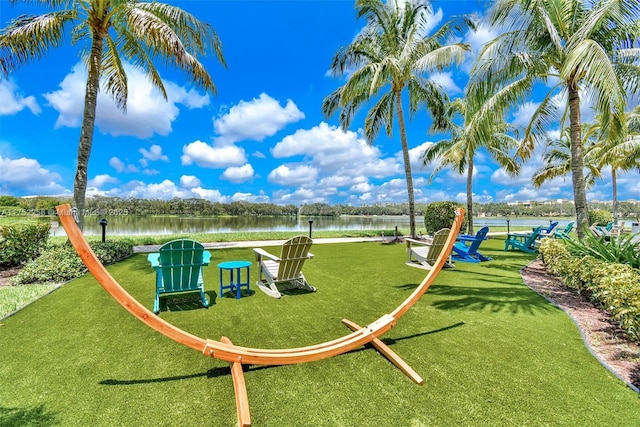2681 N Flamingo Rd Unit 1103S, Sunrise, FL 33323 - view of play area with a lawn and a water view
