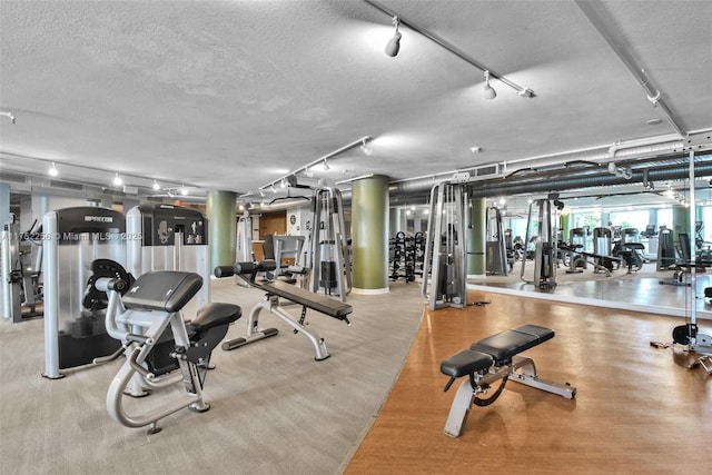 2681 N Flamingo Rd Unit 1103S, Sunrise, FL 33323 - gym featuring a textured ceiling
