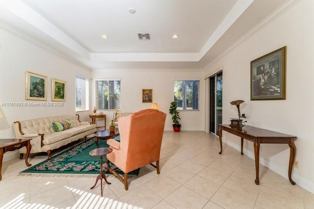 living area featuring recessed lighting, a raised ceiling, visible vents, and light tile patterned floors