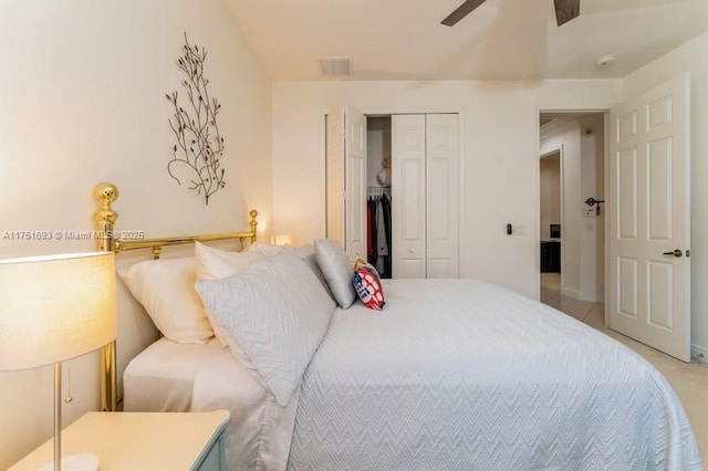 bedroom featuring a ceiling fan, a closet, and visible vents